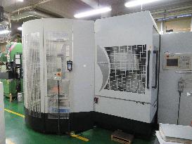 Electrical discharge machine introduced by Nagatsu Manufacturing as part of its work automation efforts.